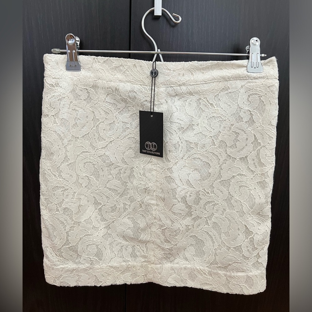White lace mini skirt. High quality material.